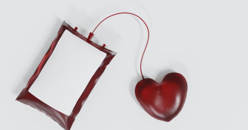 Doação de sangue com um coração como ato de amor e empatia